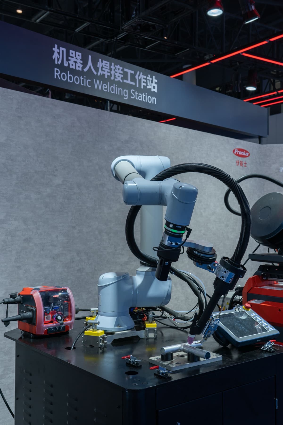 A robot arm at a welding station